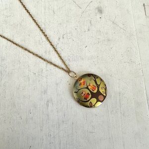 Gold tone owl locket necklace